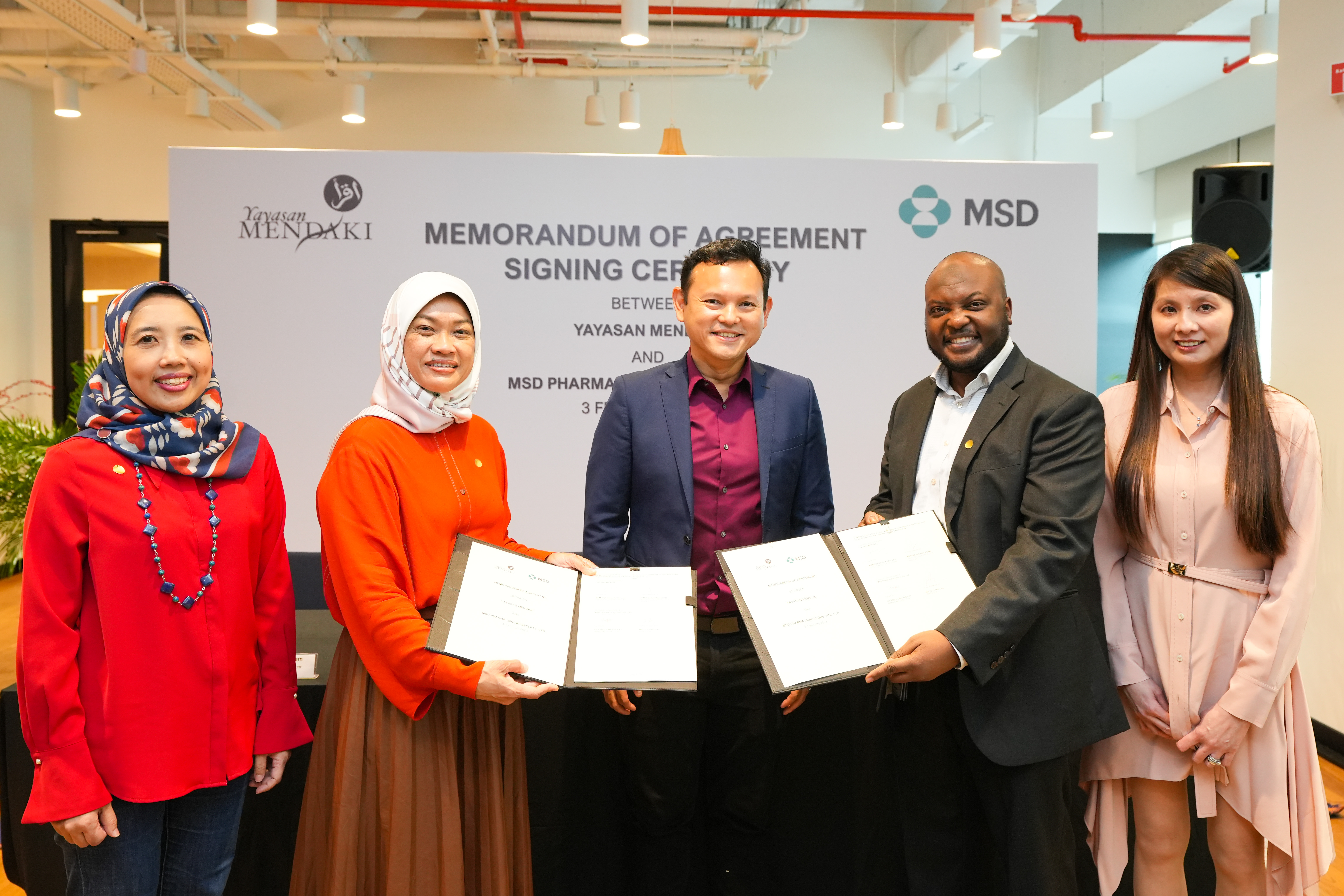 MSD Team Signing Memorandum Of Agreement with Mendaki 